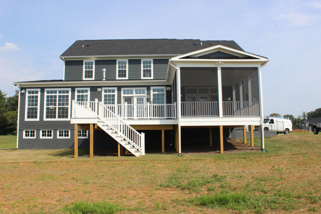 Residential deck contractor installing a new outdoor deck