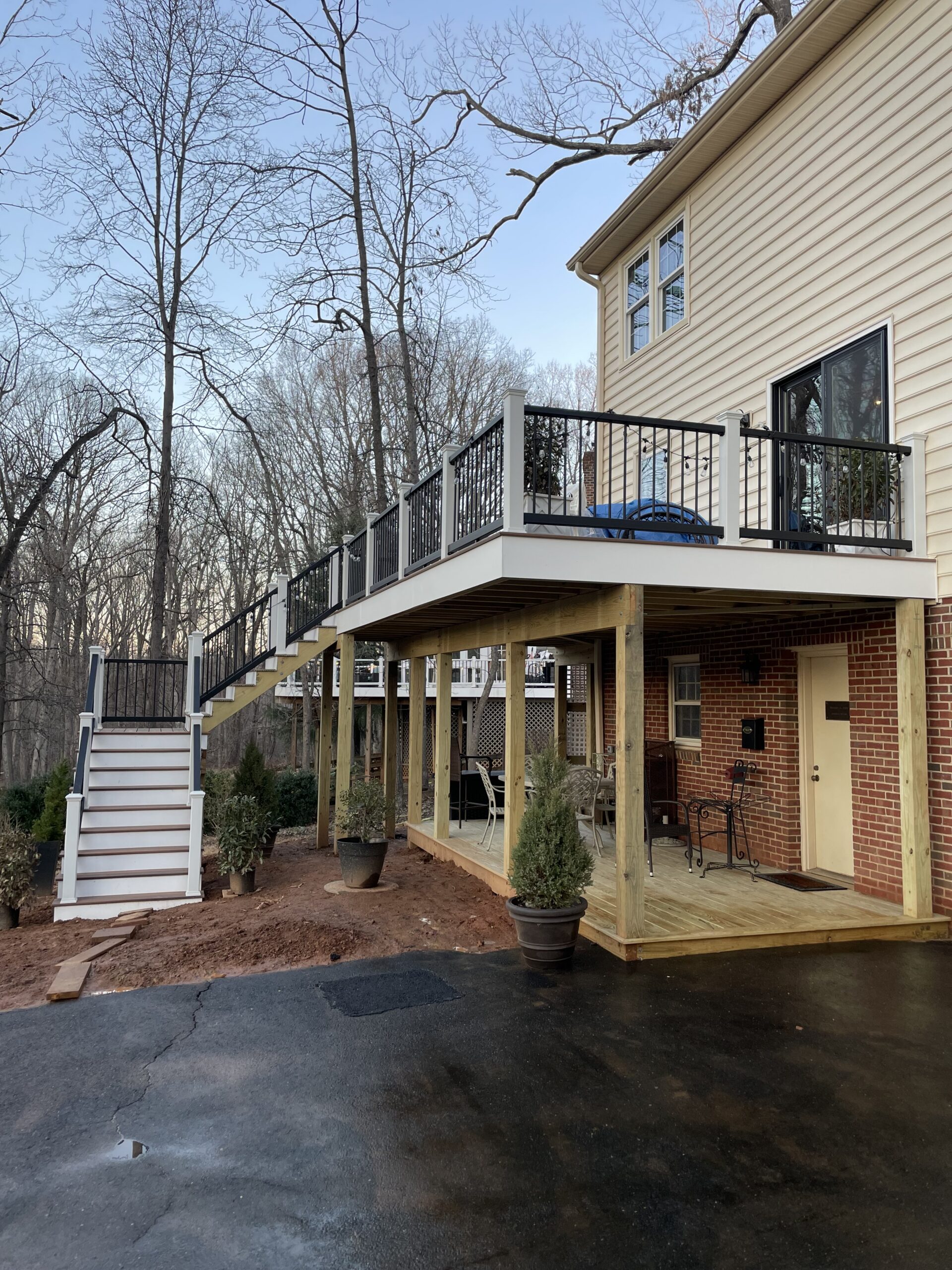 Professional deck builder installing composite deck boards