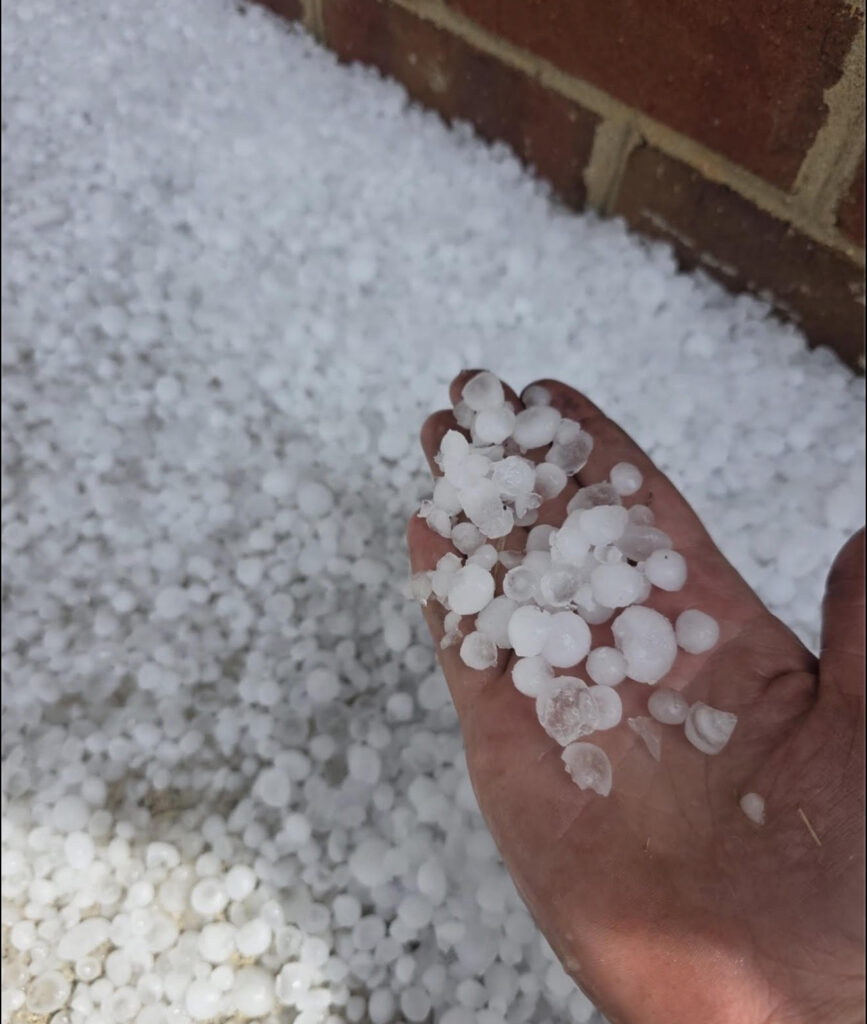 hail damage roof repair Lynchburg VA contractor inspecting shingles after storm
