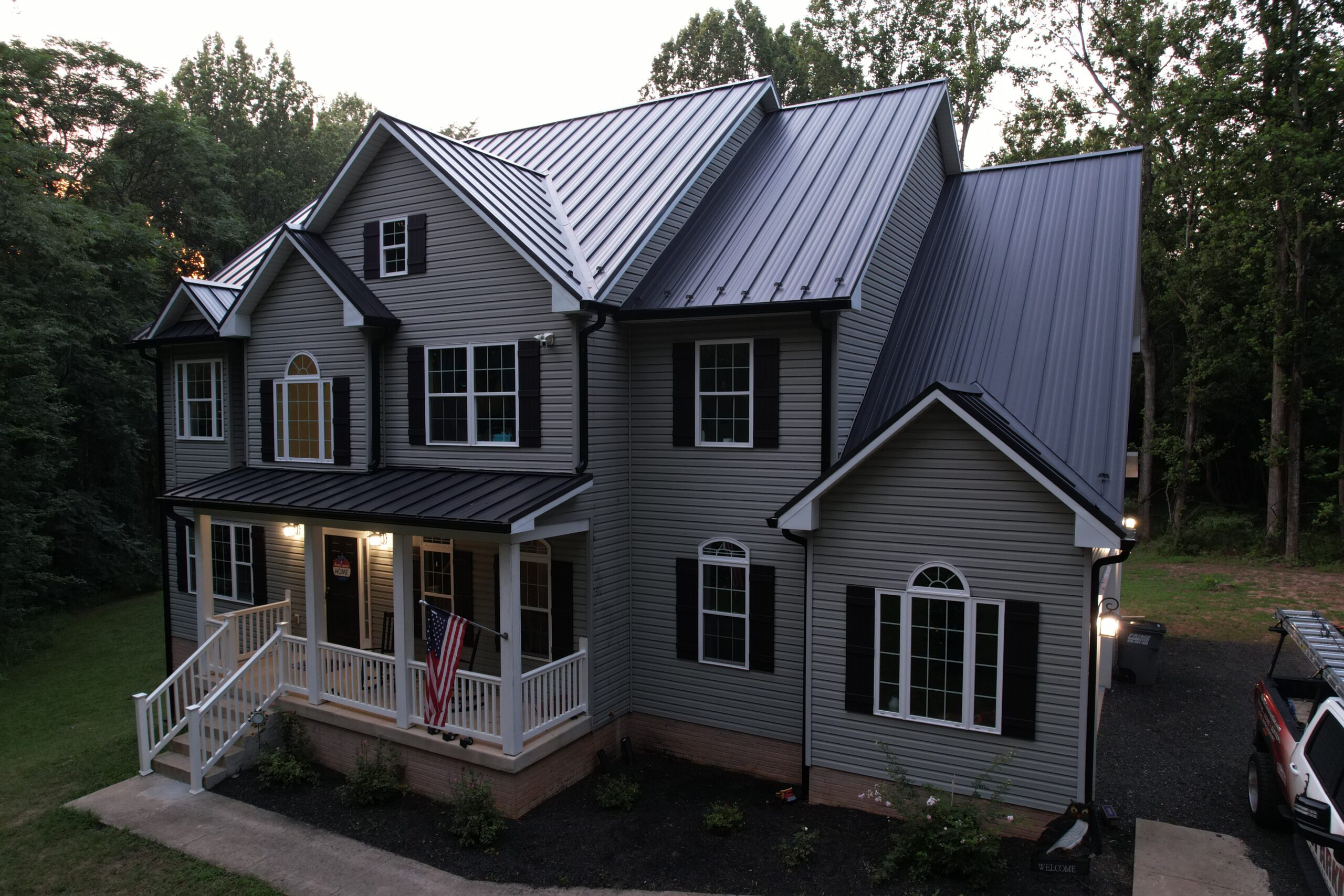 Standing seam metal roof installation in Northern Virginia by Sparkk Construction with custom fabricated panels